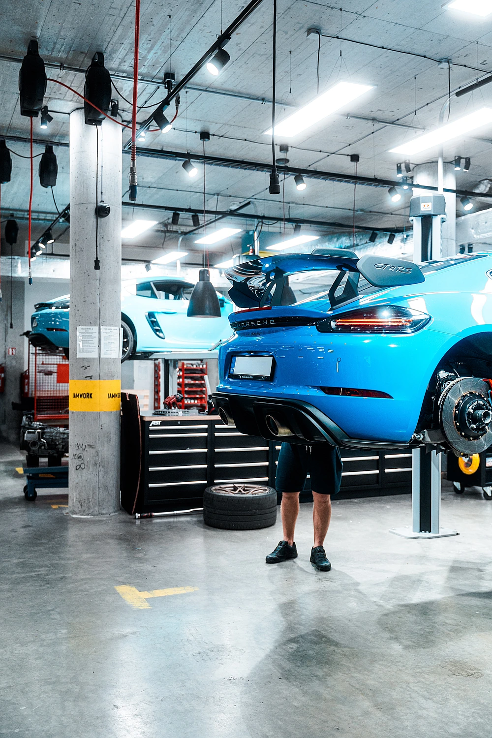 Porsche odstranění klepání od zadní nápravy, servis v IAMWORK
