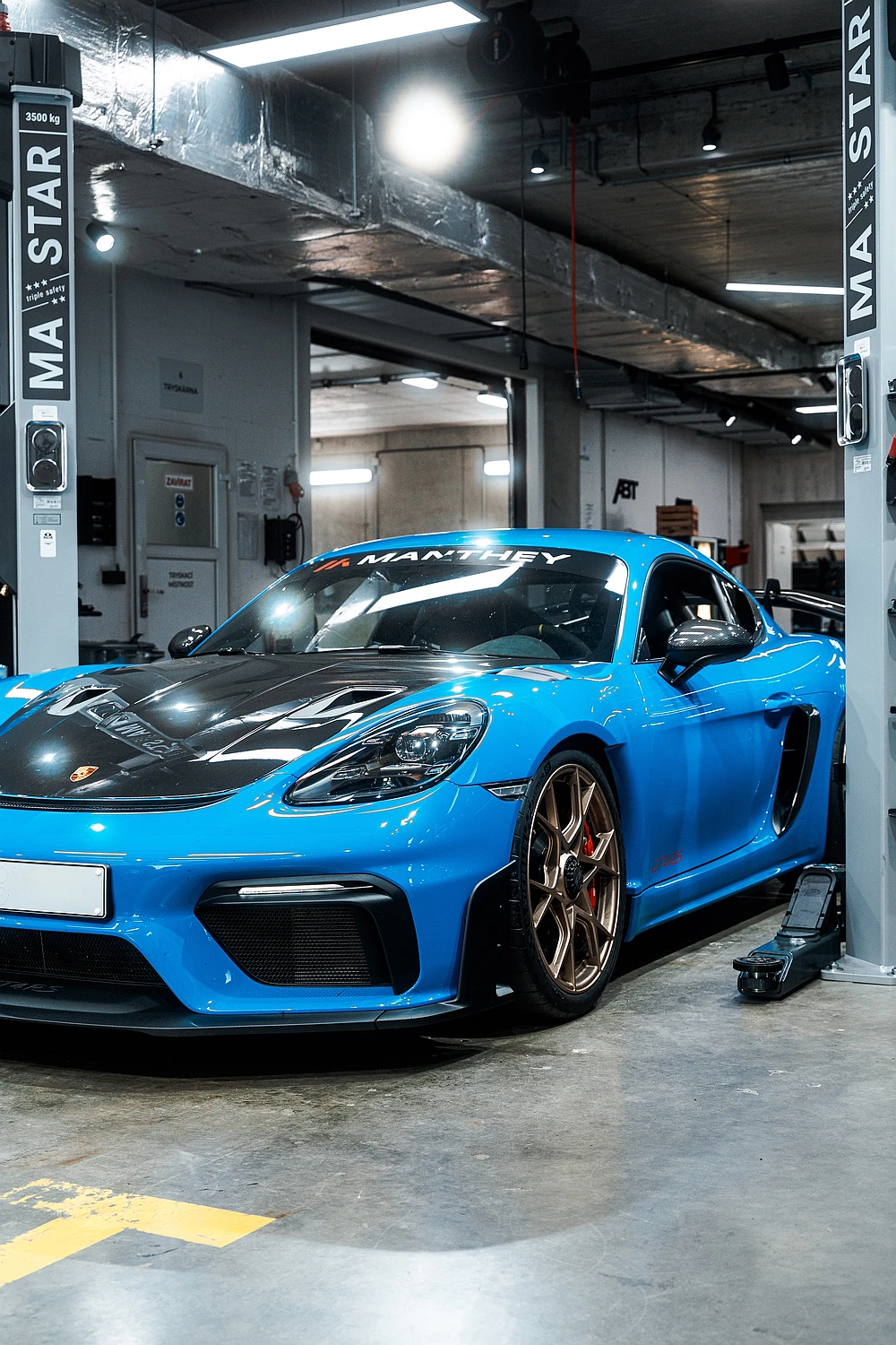 Porsche odstranění klepání od zadní nápravy, servis v IAMWORK